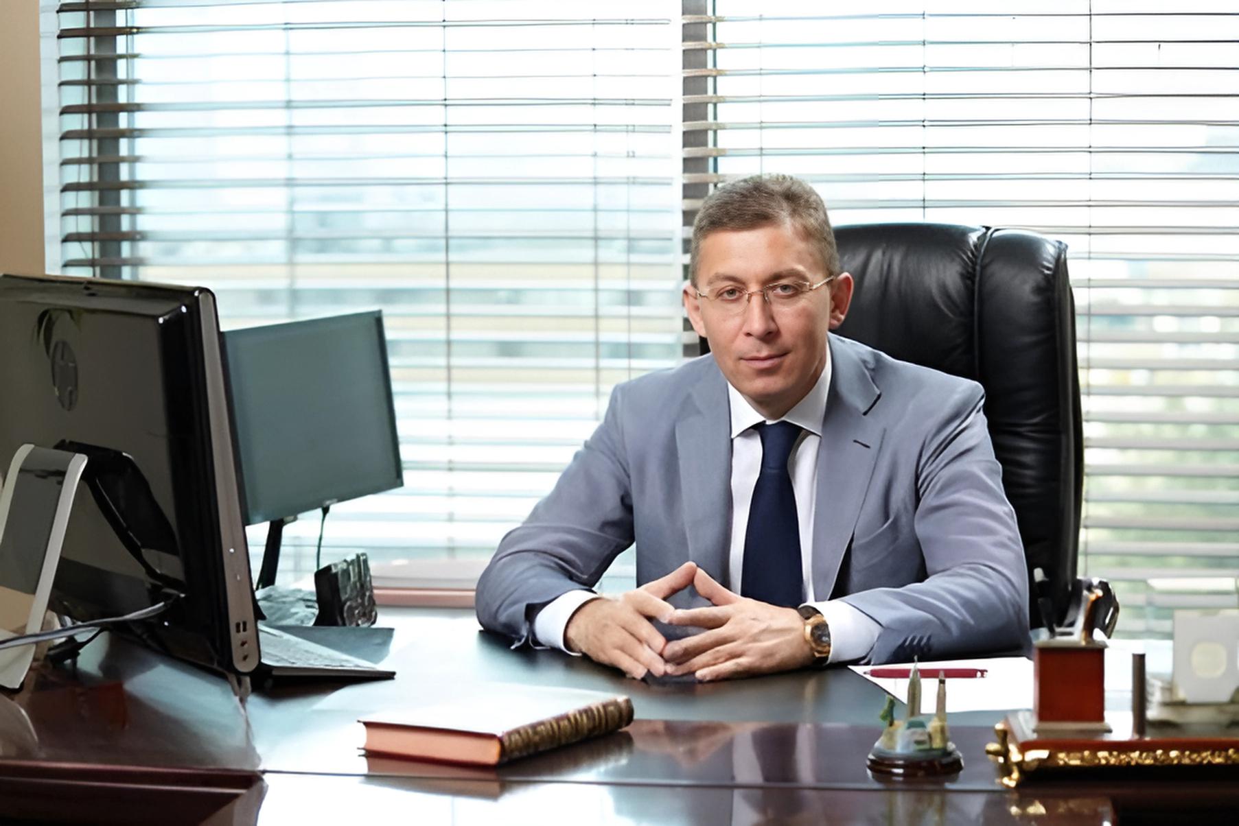 Professional sitting at office desk